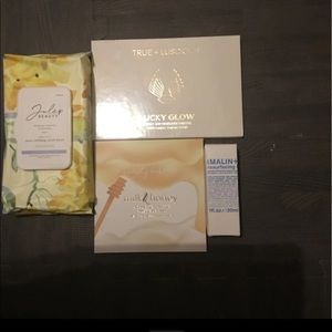 Highlighting pallets, face serum, and makeup towelettes